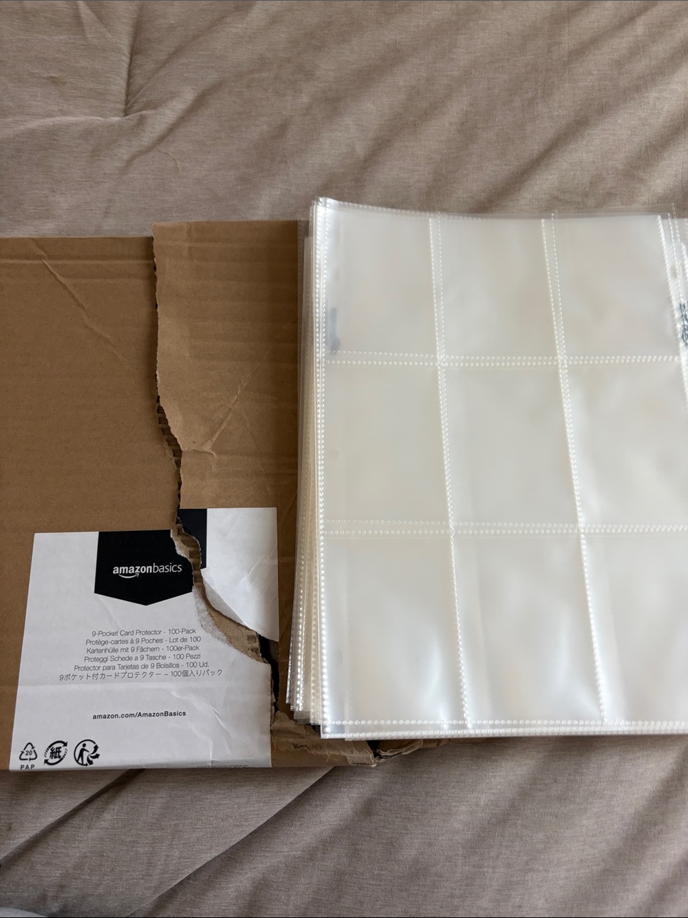 AmazonBasics 9-Pocket Card Protector Pages - White/Clear 75 sleeves left of pack